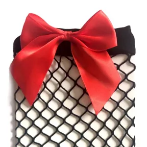 Black fishnet stockings with large red satin bow, sexy high thigh hosiery for women daily wear.