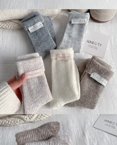 Women winter thick warm wool crew socks with cute turn-cuff cloth label cozy knit hosiery