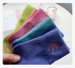 Colorful cotton mid-tube socks for women, candy color design with cute embroidery details.