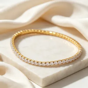 Elegant gold-plated stainless steel elastic bracelet with white zircon inlay for women