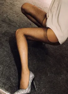 Medias de red con diamantes de imitación sexy para mujeres, mallas brillantes diseño elástico.