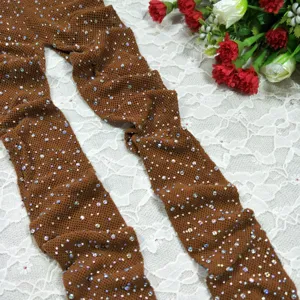 Detailed view of brown rhinestone mesh tights, sexy sparkly crystal fishnet pantyhose.