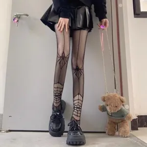 Halloween spiderweb fishnet stockings for women, black alt subculture fashion pantyhose.