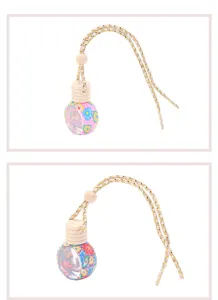Colgante de botella de perfume de arcilla suave para coche con diseño floral y cuerda.
