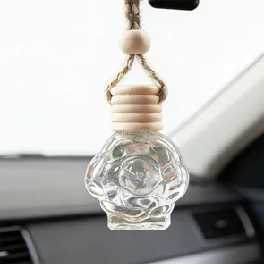 Clear glass rose shaped car perfume bottle with wooden cap, hanging pendant for auto interior.