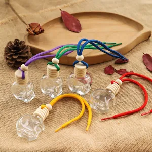 Clear apple shaped glass car perfume bottle empty hanging pendant with colorful ropes details