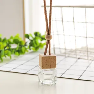 Flacon de parfum en verre suspendu pour voiture diffuseur vide avec capuchon en bois.