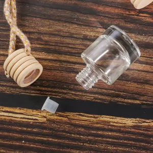 Car diffuser glass bottle detail, empty essential oil hanging perfume pendant component.