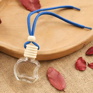 Transparent 10ml apple shaped glass car perfume bottle detail view, hanging aroma diffuser.