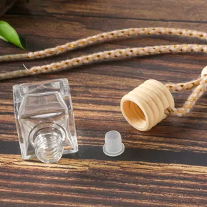 Empty square car perfume glass bottle with wooden cap and hanging rope for essential oils.