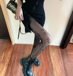 Black sexy sheer pantyhose with stylish letter prints, lightweight and slim fit for women.