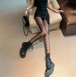 Women sexy black sheer tights with Japanese letter print, elastic slim pantyhose for club fashion.