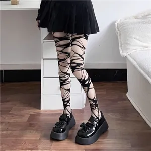Black distressed footed tights, gothic punk irregular hollow out hosiery for women.