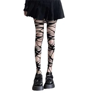 Gothic black footed tights with irregular ripped design, perfect for punk and dark Halloween styles.
