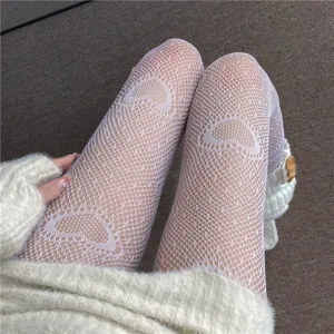 White fishnet tights with cute heart pattern, stylish Y2K hollow out hosiery for women.