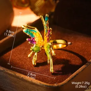 Detailed macro shot of vintage rainbow enamel butterfly ring featuring size and weight specs
