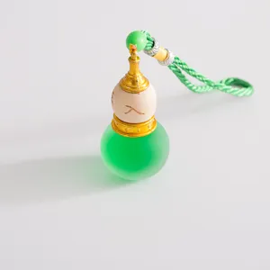 Car aromatherapy essential oil gourd pendant diffuser, stylish interior hanging ornament for vehicle.