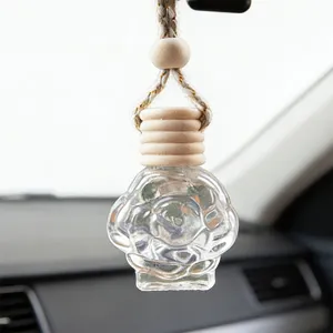 Rose shaped glass car perfume bottle with wooden cap and hanging rope for interior decor