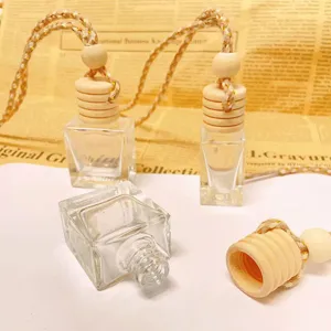 Car hanging perfume glass bottle with wooden cap essential oil diffuser pendant for rearview mirror.