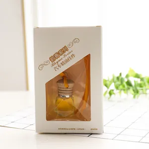Car perfume pendant essential oil diffuser with multifaceted glass bottle and wooden cap.