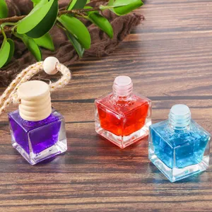 Square glass car perfume bottle hanging pendant aromatherapy diffuser bottle for vehicle interior.