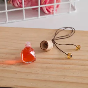 Crystal car perfume bottle pendant with liquid, hanging aromatherapy glass ornament for auto.