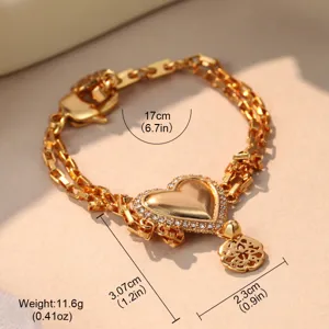 Detailed view of golden heart charm bracelet with size measurements and weight info