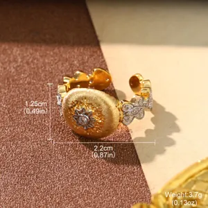 Detailed view of vintage gold ring with dimensions 2.2cm by 1.25cm and weight 3.7g.