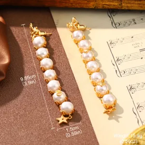 Detailed view of vintage gold-tone pearl tassel earrings with precise size measurements