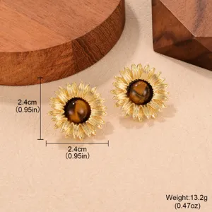 Detailed macro view of vintage sunflower earrings with tiger eye stone and size
