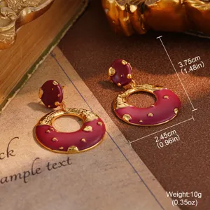 Detailed view of vintage burgundy enamel and gold earrings with dimension measurements
