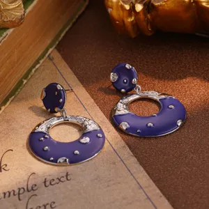 Retro purple enamel hoop earrings with silver hammered texture detail