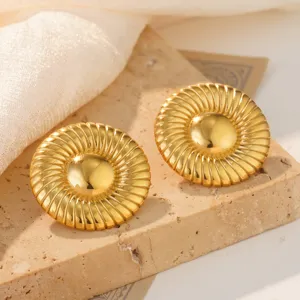 Gold stainless steel conch shell style earrings with radial spiral design details