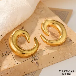 Close-up of gold stainless steel spiral earrings showing dimensions and weight info