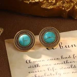 Ornate vintage turquoise stud earrings featuring gold bead trim in French palace style.
