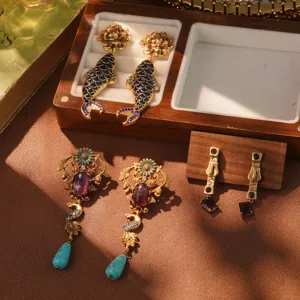 Boucles d'oreilles vintage style cour dorées avec motifs de poissons et paons