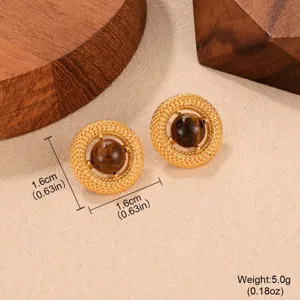 Vintage gold textured round stud earrings featuring natural central tiger eye stones