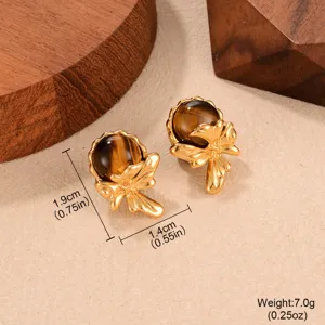 Close-up detail of retro tiger's eye earrings with gold bow design and dimensions