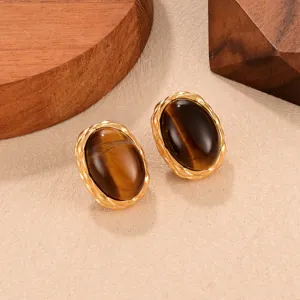 Vintage goldfarbene Ohrringe mit ovalen braunen Tigeraugen-Steinen und geflochtenem Rand.