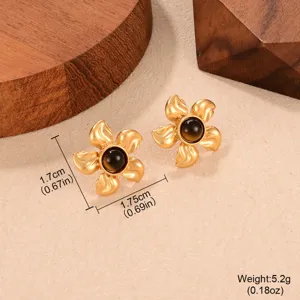 Detalle de pendientes vintage con forma de flor, piedra ojo de tigre y dimensiones