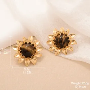Vintage sunflower earrings with tiger eye stone center and gold-tone finish petals