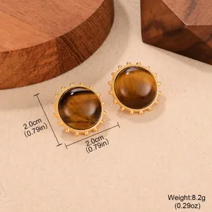 Detail view of vintage tiger eye stud earrings with size and weight measurements.