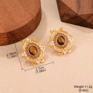 Vue détaillée des boucles d'oreilles vintage en œil de tigre avec dimensions et poids