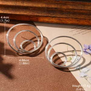 Detailed view of minimalist silver triple-layered hoop earrings with size and weight info
