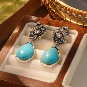 Vintage French court style peacock earrings with pear-shaped turquoise stones