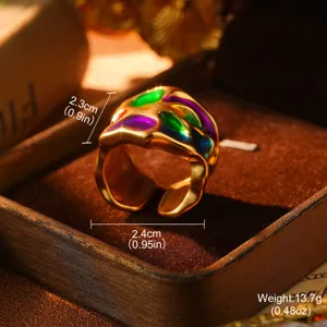 Close-up of vintage gold ring with colorful rainbow enamel detailing and dimensions