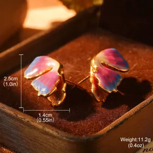 Macro view of rainbow enamel butterfly earrings with size and weight annotations