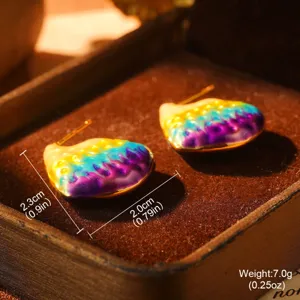 Detailed macro view of these vintage oil painting style rainbow enamel stud earrings
