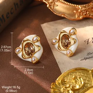 Vintage gold-tone earrings with champagne crystal and white pearls, 2.8cm wide dimensions.