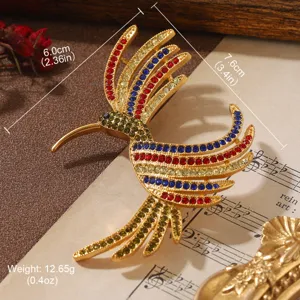 Vintage bird brooch with multicolored rhinestones showing detailed size and weight.